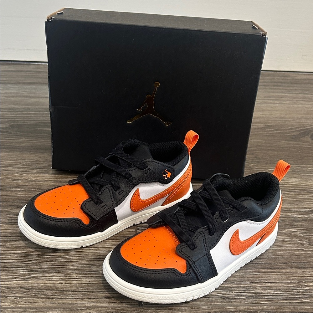 NEW Nike Kids' Jordan 1 Low Alt orange, white and black